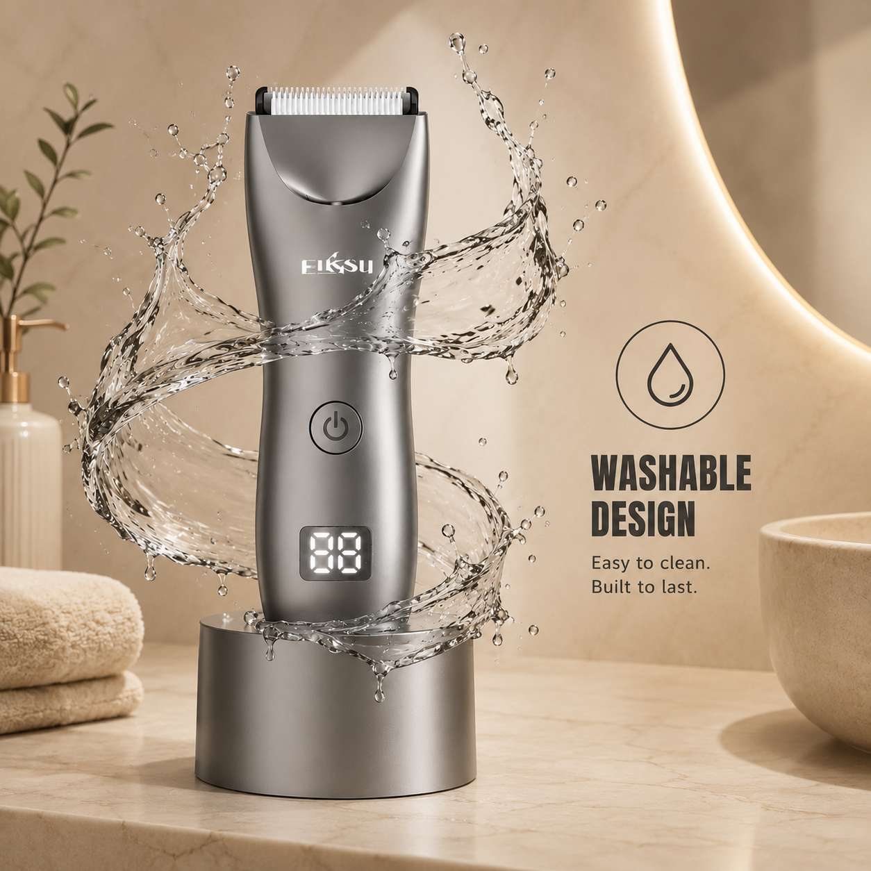Enssu titanium grey hair trimmer with washable design. Highlighted by water splashes, emphasizing easy cleaning, professional quality, and durability.