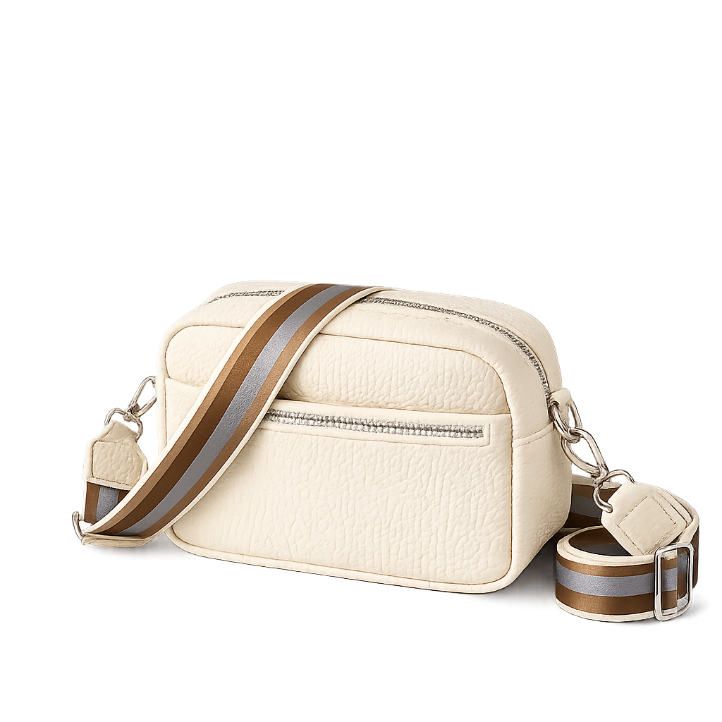 Beige camera-style crossbody bag featuring a pebbled textured finish, silver zippers, and a wide fabric strap with brown and beige stripes on a transparent background